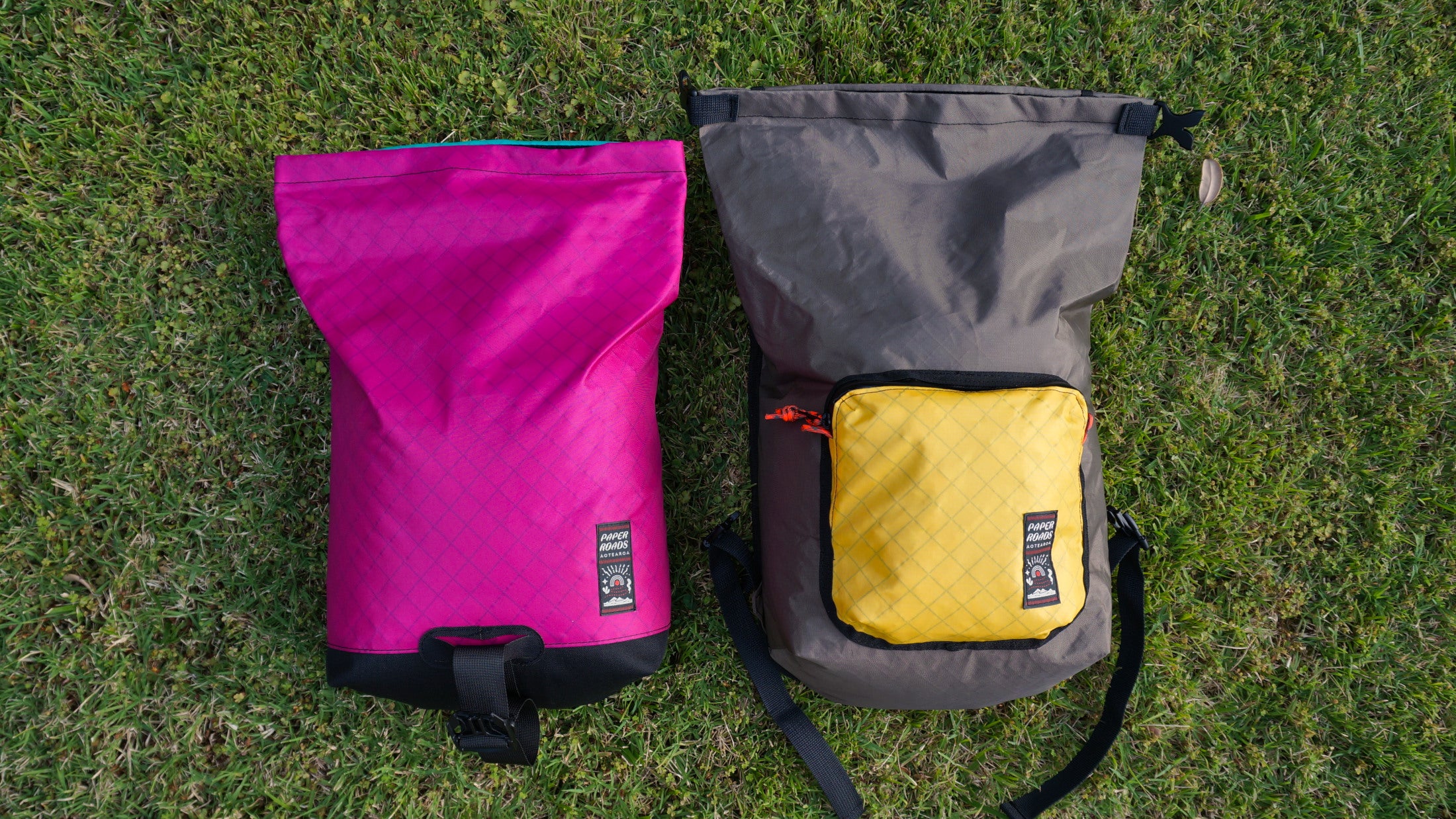 Bikepacking touring roll top panniers 8L and 12L. Custom handmade ultralight waterproof, sturdy for riding gravel and mountain bike trails. Made New Zealand bike bags.