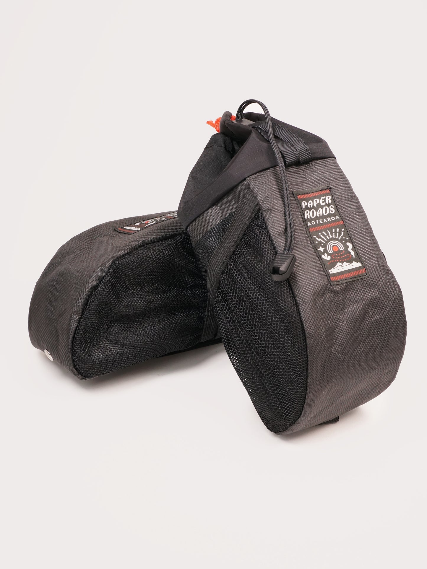Large handlebar stem bag treat bag for cycling, commuting or bikepacking. Easy access to snacks or bottle, one handed opening. Brown with white top. Ultra tech fabric in grey. Made in New Zealand.