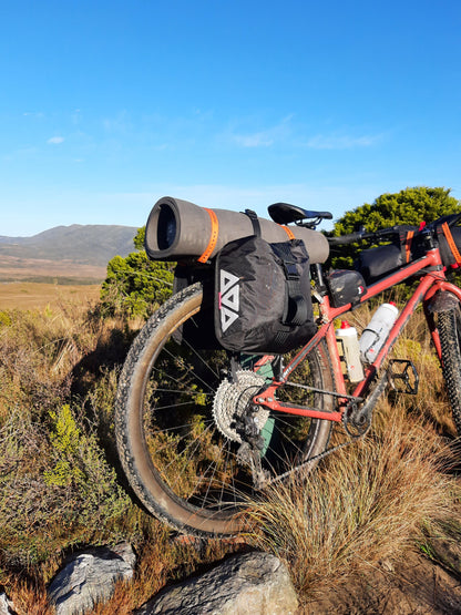 Bikepacking touring roll top panniers 12L. Custom handmade ultralight waterproof, sturdy for riding gravel and mountain bike trails. Made in Auckland, New Zealand bike bags. 