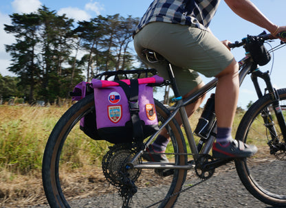 Bikepacking touring roll top panniers 8L. Custom handmade ultralight waterproof, sturdy for riding gravel and mountain bike trails. Made in Auckland, New Zealand bike bags. 
