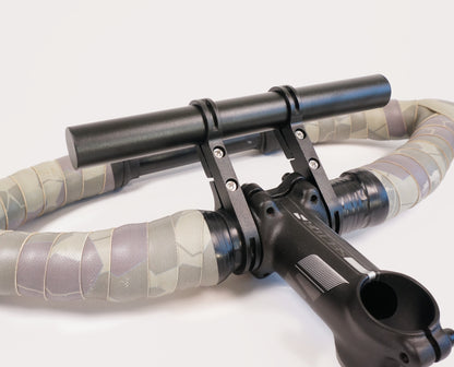 Bar riser handelbar extension mount for lights, Garmin, GPS gadgets. Bikepacking, touring, commuting, bike riding.