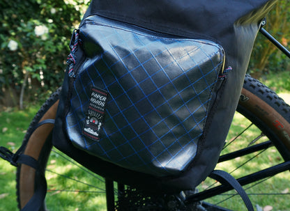 Bikepacking touring roll top panniers 12L. Custom handmade ultralight waterproof, sturdy for riding gravel and mountain bike trails. Made in Auckland, New Zealand bike bags. 