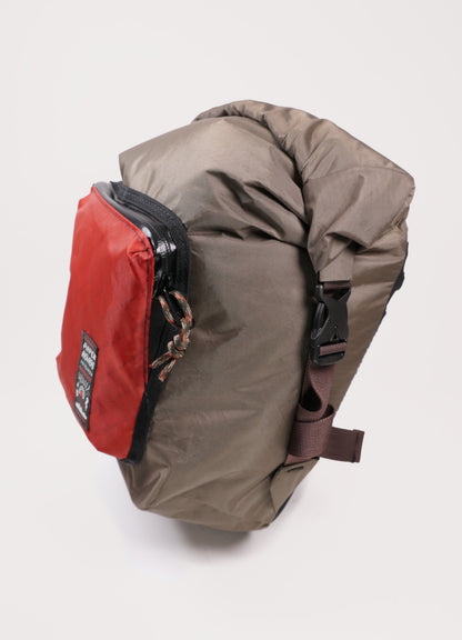Bikepacking, bike touring, gravel cycling panniers with roll top and front pocket. Custom made in New Zealand.