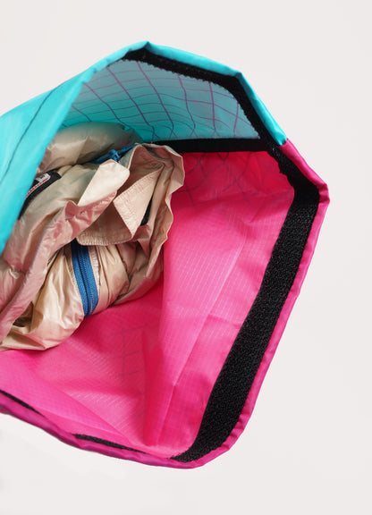 Bikepacking touring roll top panniers 8L. Custom handmade ultralight waterproof, sturdy for riding gravel and mountain bike trails. Made in Auckland, New Zealand bike bags. 