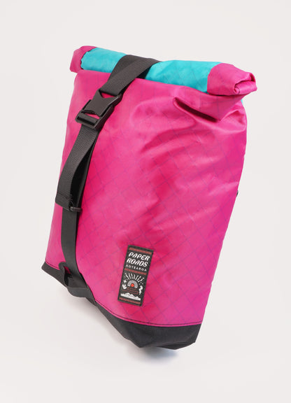 Bikepacking touring roll top panniers 8L. Custom handmade ultralight waterproof, sturdy for riding gravel and mountain bike trails. Made in Auckland, New Zealand bike bags. 