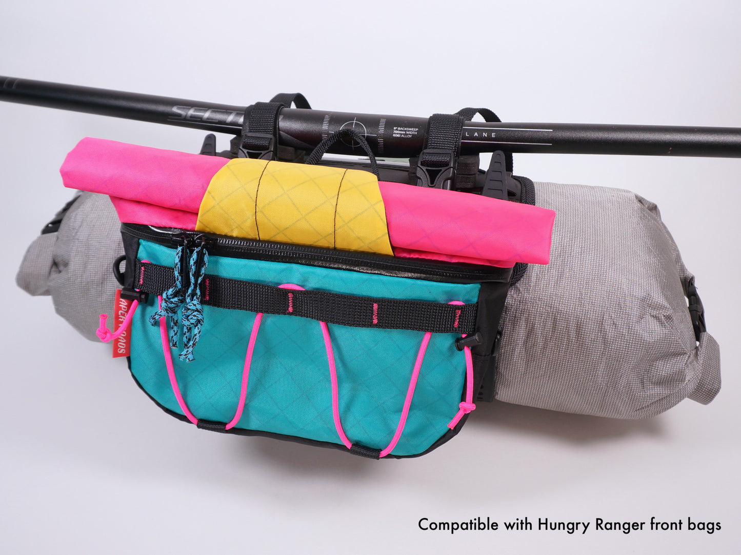 Bikepacking handlebar minimalist harness with Voile straps and Hungry Ranager bag. NZ made.