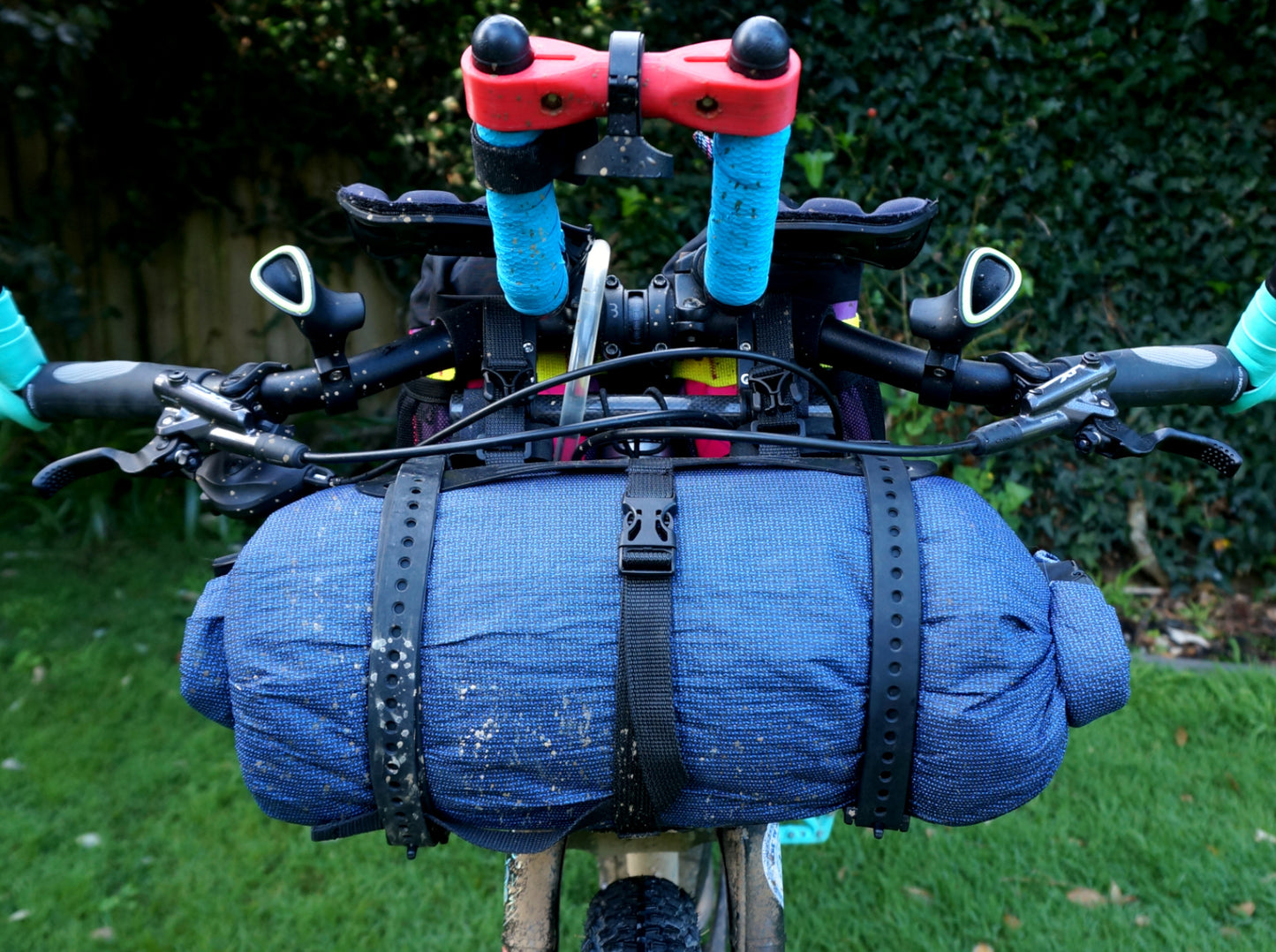 Bikepacking touring front roll dry bag harness ultralight NZ made Voile straps Tour Aotearoa Kopiko Sounds 2 Sound Tour Divide GDMTR race New Zealand Australia