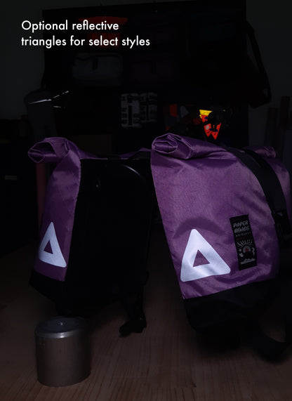 Bikepacking touring roll top panniers 8L. Custom handmade ultralight waterproof, sturdy for riding gravel and mountain bike trails. Made in Auckland, New Zealand bike bags. 