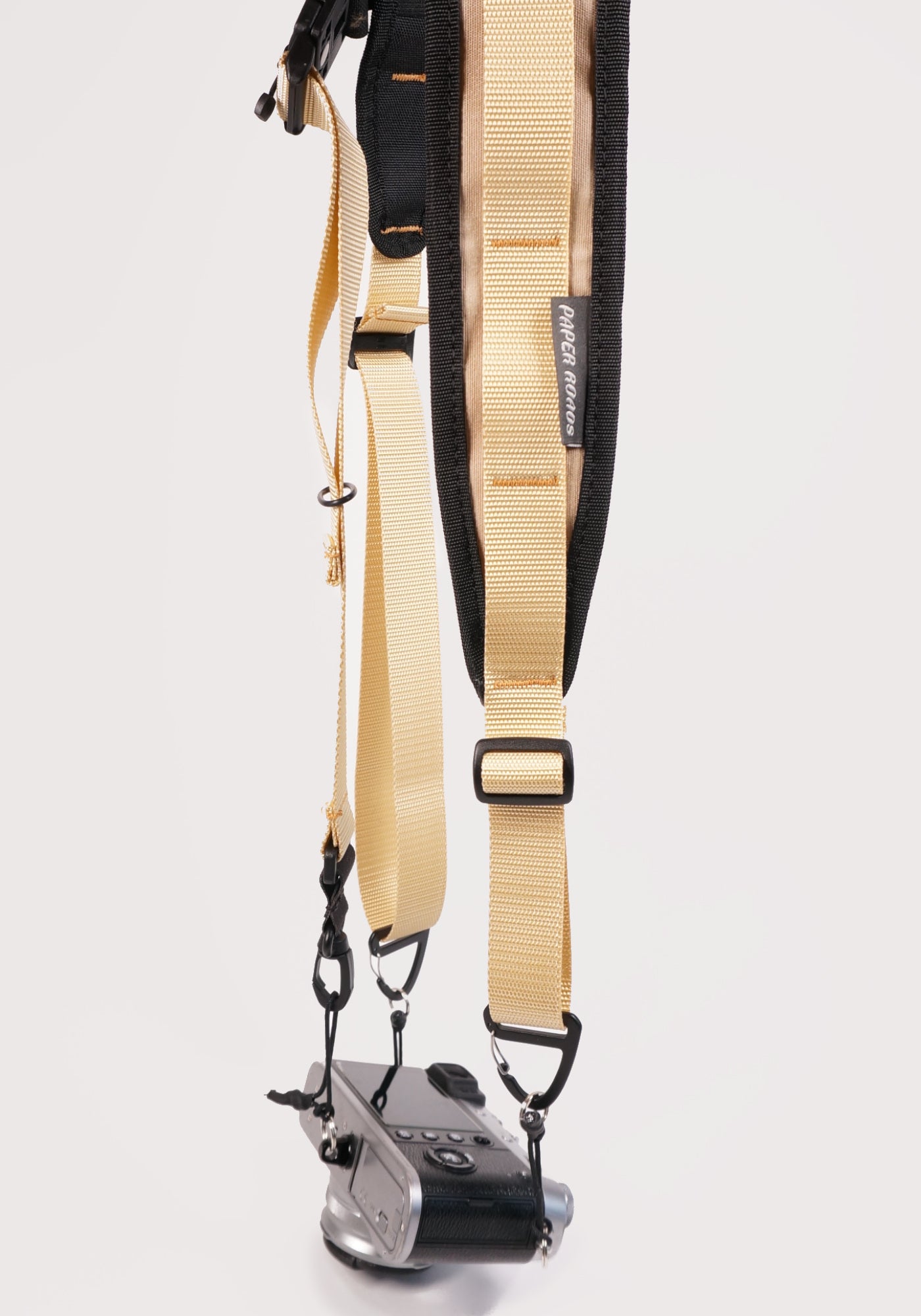 cycling 3 point camera strap harness gravel bikepacking photography film shoot single handed. Paper Roads handmade new zealand colour beige cream