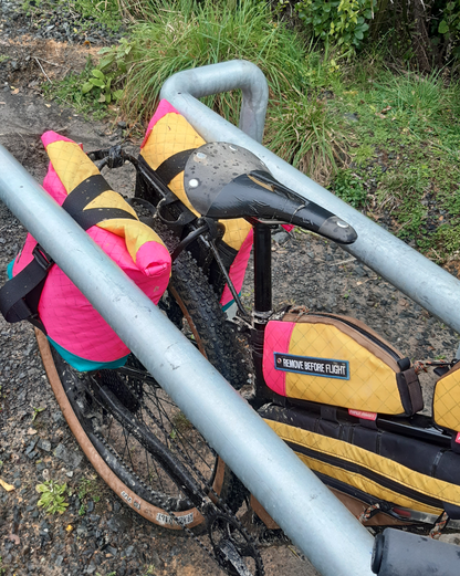 Bikepacking touring roll top panniers 8L. Custom handmade ultralight waterproof, sturdy for riding gravel and mountain bike trails. Made in Auckland, New Zealand bike bags. 