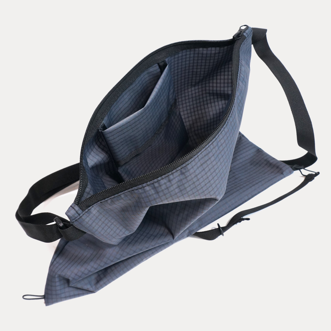 Cycling biking bikepacking touring musette. Small packable shoulder bag for shopping or commuting. Made in New Zealand by Paper Roads Aotearoa. Colourful, souvenir, gift.