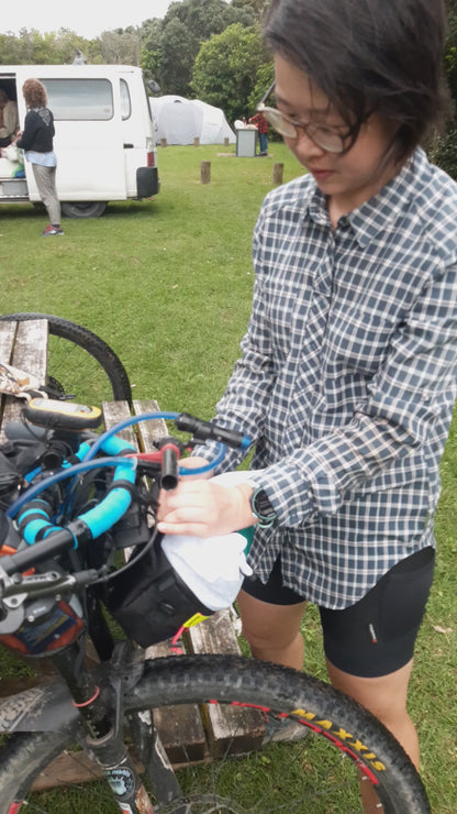 Bikepacking front harness bag with roll top and zips. Carry food and supplies.